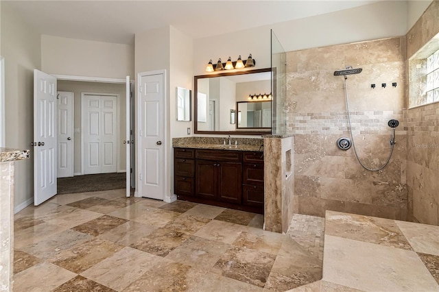 1201 Shelter Rock Rd, Orlando, FL 32835 - full bath with vanity, walk in shower, and stone tile flooring