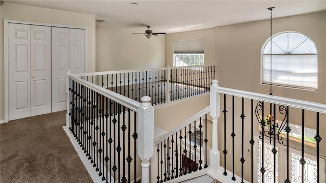1201 Shelter Rock Rd, Orlando, FL 32835 - corridor with carpet and an upstairs landing