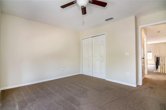1201 Shelter Rock Rd, Orlando, FL 32835 - unfurnished bedroom featuring carpet flooring, baseboards, a closet, and ceiling fan
