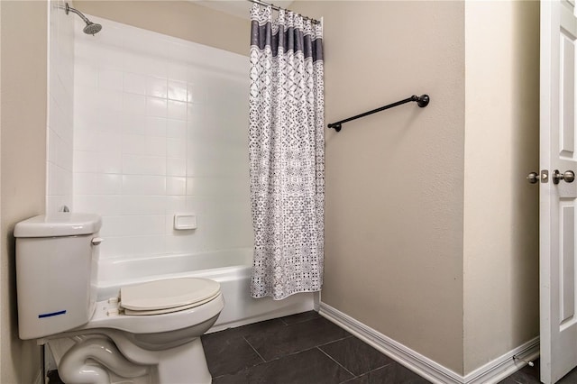 1201 Shelter Rock Rd, Orlando, FL 32835 - full bath with toilet, shower / tub combo, tile patterned floors, and baseboards