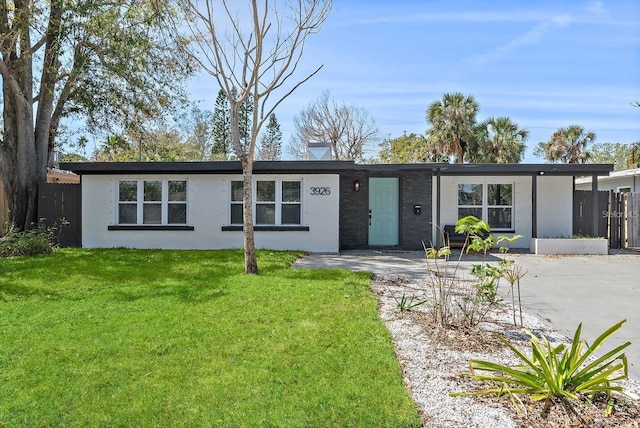 3926 Helena St NE, Saint Petersburg, FL 33703 - view of front of home featuring stucco siding