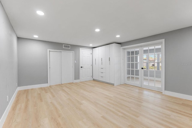 3926 Helena St NE, Saint Petersburg, FL 33703 - empty room with baseboards, light wood-type flooring, and recessed lighting