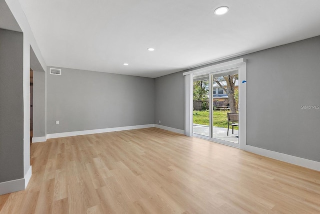 3926 Helena St NE, Saint Petersburg, FL 33703 - empty room with light wood-style floors, baseboards, and recessed lighting