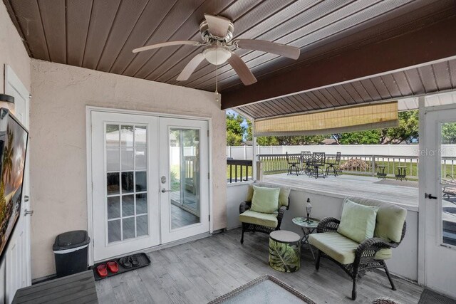 950 Gatewood Ct NE, Palm Bay, FL 32905 - sunroom / solarium with french doors, ceiling fan, and plenty of natural light