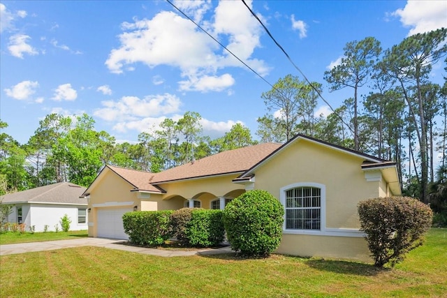 45 Powder Horn Dr, Palm Coast, FL 32164 - single story home featuring concrete driveway, an attached garage, stucco siding, and a front yard