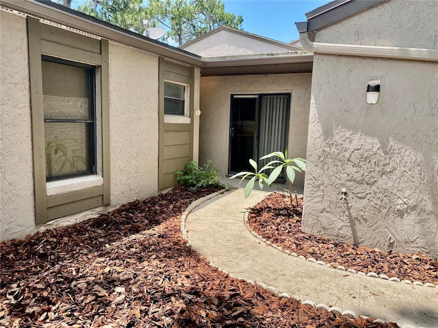 650 Woodridge Dr, Fern Park, FL 32730 - entrance to property featuring stucco siding