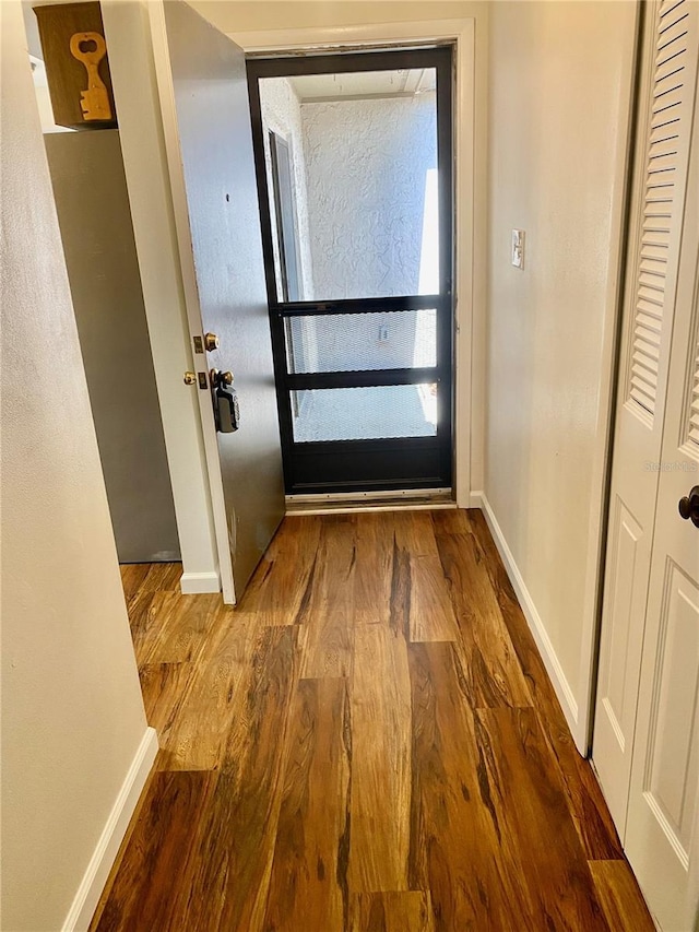 650 Woodridge Dr, Fern Park, FL 32730 - doorway to outside with wood finished floors and baseboards