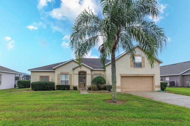 view of front of house featuring stucco siding, a garage, concrete driveway, and a front yard