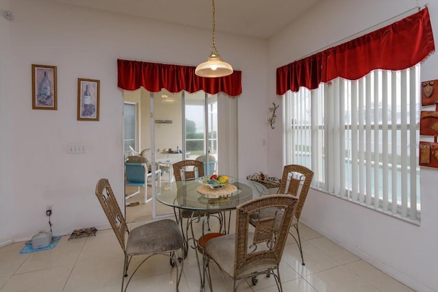 tiled dining area with baseboards