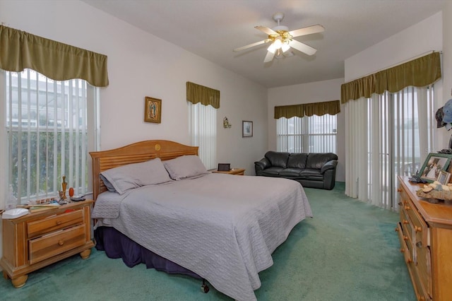 bedroom featuring carpet floors and a ceiling fan