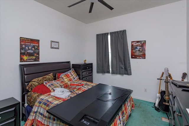 bedroom featuring carpet, baseboards, and ceiling fan