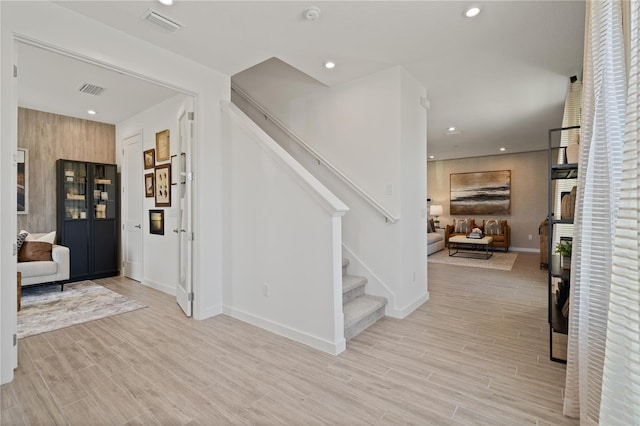 2054 Education St, Saint Cloud, FL 34771 - entrance foyer with stairs, baseboards, light wood-style flooring, and recessed lighting
