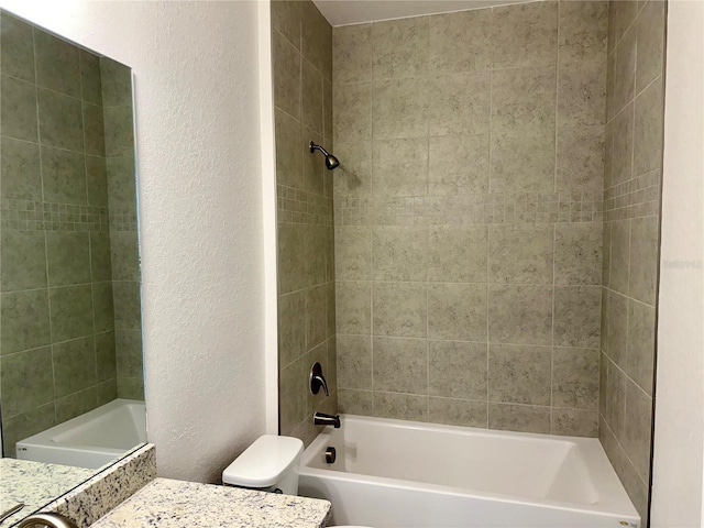 27206 Adams St, Punta Gorda, FL 33983 - full bathroom featuring a textured wall, vanity, toilet, and shower / bathtub combination