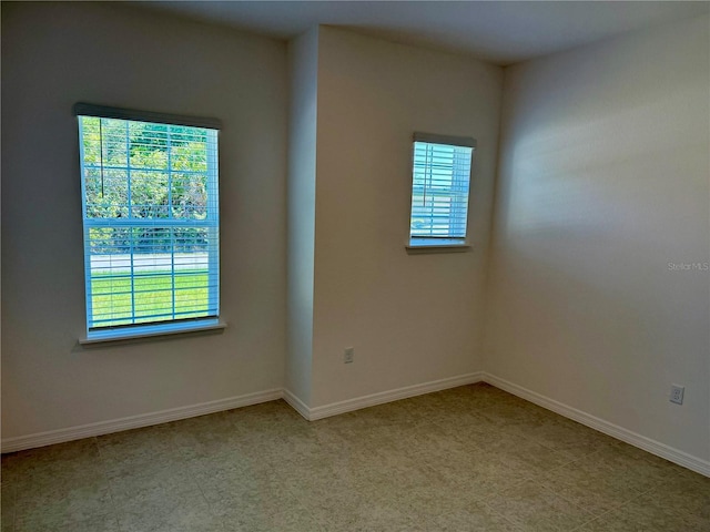 27206 Adams St, Punta Gorda, FL 33983 - spare room featuring baseboards