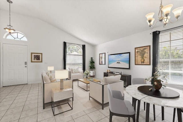 4249 Andover Cay Blvd, Orlando, FL 32825 - living area featuring vaulted ceiling, a chandelier, light tile patterned floors, and healthy amount of natural light