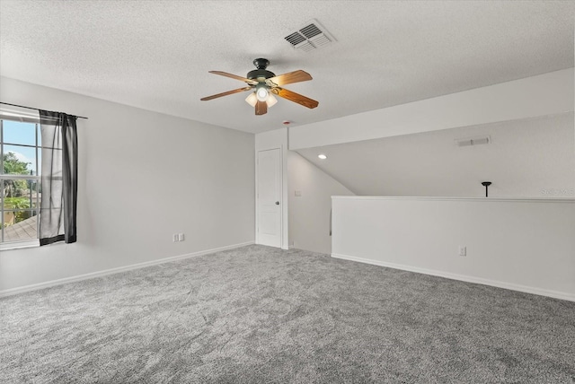 4249 Andover Cay Blvd, Orlando, FL 32825 - empty room with a ceiling fan, a textured ceiling, carpet floors, and baseboards