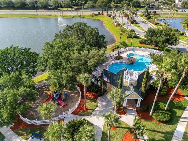4249 Andover Cay Blvd, Orlando, FL 32825 - bird's eye view of a nearby body of water, a pool area, and a tree filled landscape