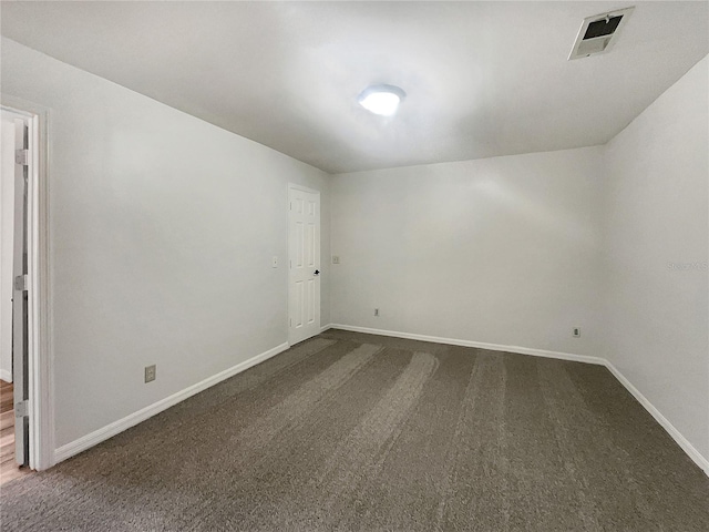 3321 Crimson Ln, Deltona, FL 32738 - unfurnished room featuring baseboards and dark colored carpet