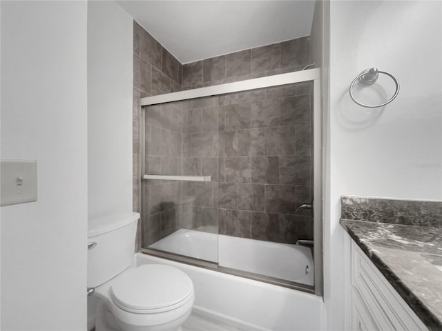 3321 Crimson Ln, Deltona, FL 32738 - bathroom with shower / bath combination with glass door, vanity, and toilet