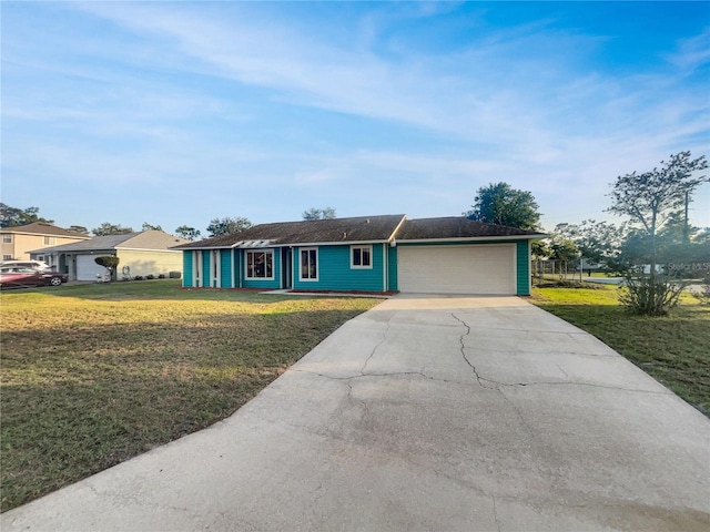 3321 Crimson Ln, Deltona, FL 32738 - single story home with an attached garage, driveway, and a front yard