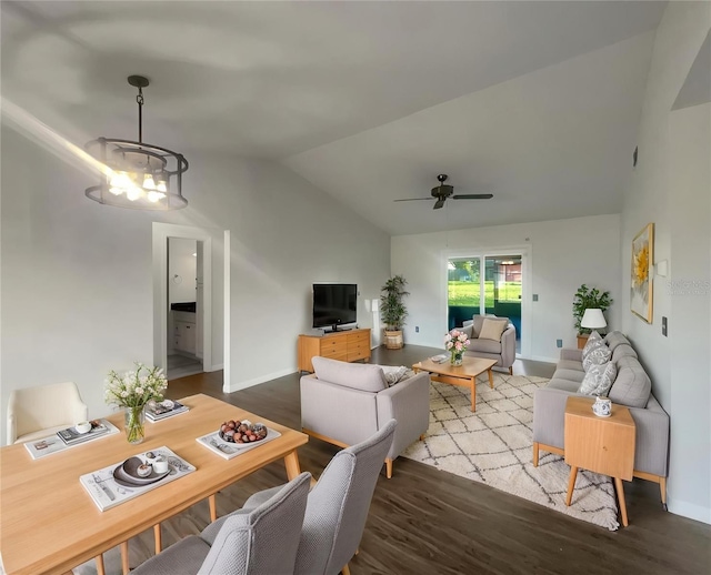 3321 Crimson Ln, Deltona, FL 32738 - dining area with lofted ceiling, baseboards, a ceiling fan, and wood finished floors
