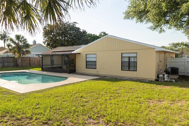 5547 Garden Grove Cir, Winter Park, FL 32792 - rear view of house with a sunroom and central air condition unit