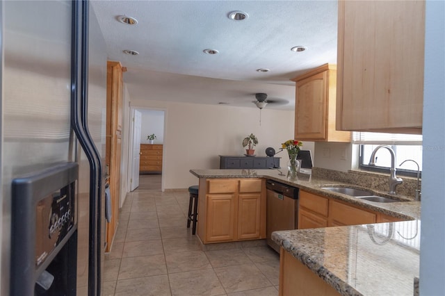 5547 Garden Grove Cir, Winter Park, FL 32792 - kitchen featuring refrigerator with ice dispenser, a sink, stainless steel dishwasher, a peninsula, and light brown cabinetry