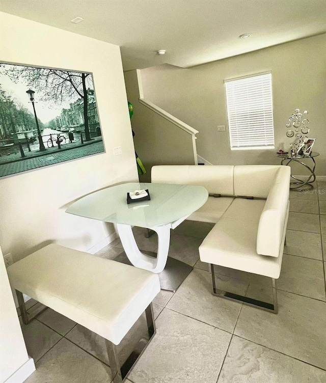 17148 Cagan Crossings Blvd, Clermont, FL 34714 - dining area with stairs and tile patterned floors