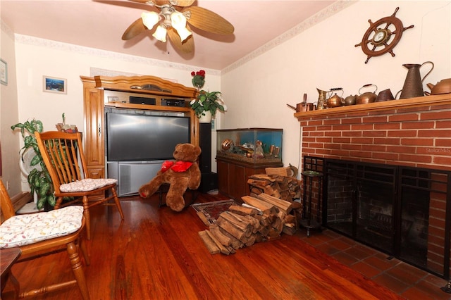 330 Phoenix Ave, Daytona Beach, FL 32118 - living room featuring ceiling fan, wood finished floors, and a brick fireplace