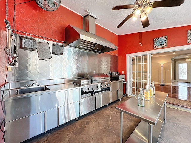 5127 Leeward Way, Orlando, FL 32809 - kitchen featuring extractor fan, backsplash, a textured ceiling, a ceiling fan, and a sink