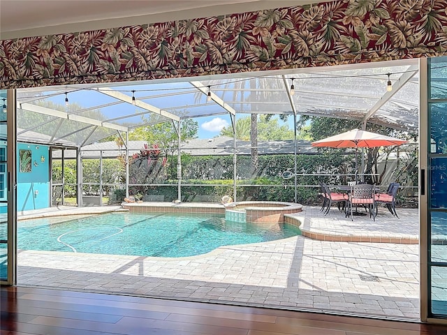 5127 Leeward Way, Orlando, FL 32809 - view of pool featuring a lanai, a patio area, and a pool with connected hot tub