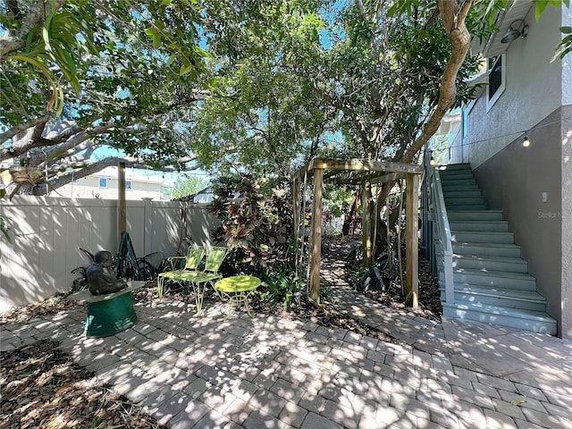 5127 Leeward Way, Orlando, FL 32809 - view of patio featuring stairs and fence