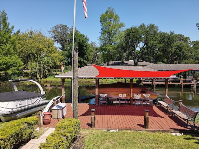 5127 Leeward Way, Orlando, FL 32809 - dock featuring a water view, boat lift, and view of scattered trees