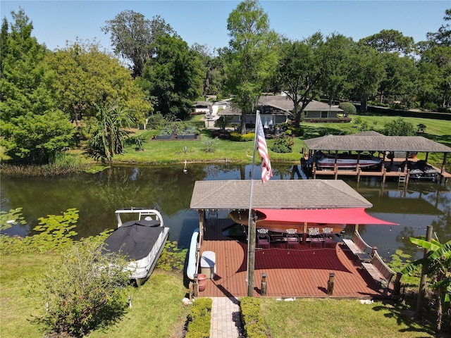 5127 Leeward Way, Orlando, FL 32809 - dock featuring a water view, view of wooded area, and a lawn