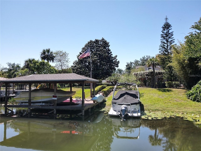 5127 Leeward Way, Orlando, FL 32809 - dock area featuring boat lift, a yard, and a water view