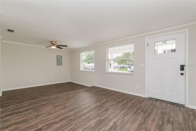 6426 Eden Ln, Tampa, FL 33634 - foyer entrance with dark wood finished floors, crown molding, electric panel, baseboards, and ceiling fan