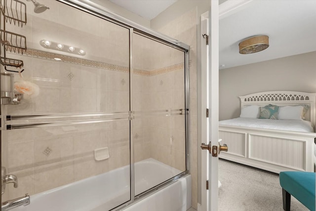 bathroom featuring shower / bath combination with glass door