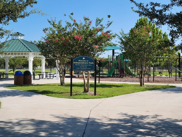 view of property's community featuring a gazebo and a lawn