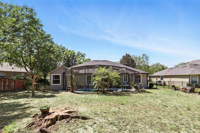 3451 Players Point Loop, Apopka, FL 32712 - rear view of house featuring glass enclosure