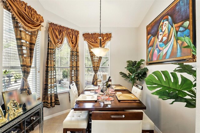 3451 Players Point Loop, Apopka, FL 32712 - tiled dining room featuring vaulted ceiling and baseboards