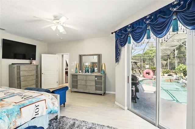 3451 Players Point Loop, Apopka, FL 32712 - bedroom with access to outside, wood finished floors, baseboards, and ceiling fan