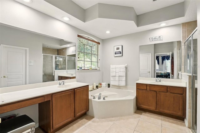 3451 Players Point Loop, Apopka, FL 32712 - bathroom with a stall shower, a garden tub, tile patterned floors, two vanities, and recessed lighting