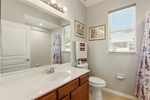 3451 Players Point Loop, Apopka, FL 32712 - bathroom with toilet, tile patterned floors, vanity, baseboards, and a shower with curtain