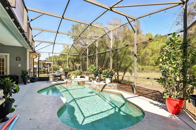 3451 Players Point Loop, Apopka, FL 32712 - view of swimming pool with a patio, a pool with connected hot tub, and glass enclosure