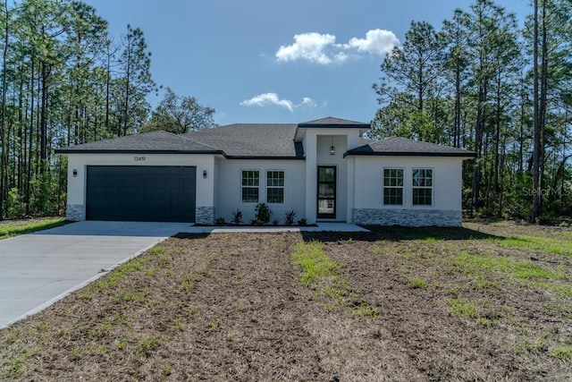 13419 SW 77th Ave, Ocala, FL 34473 - prairie-style home featuring stone siding, a garage, stucco siding, and driveway
