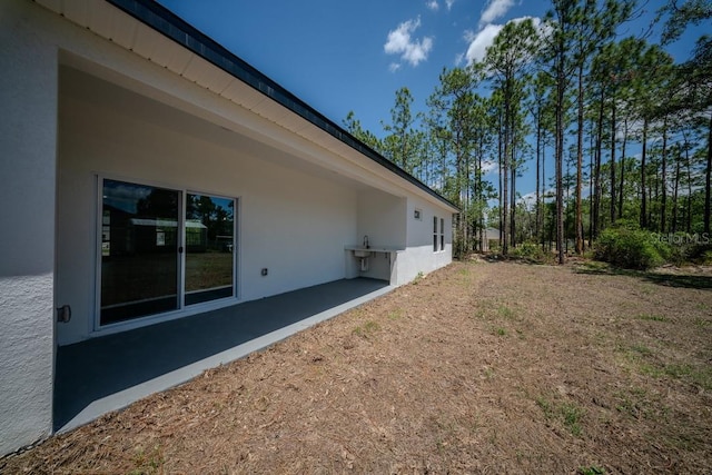 13419 SW 77th Ave, Ocala, FL 34473 - view of yard featuring a patio area