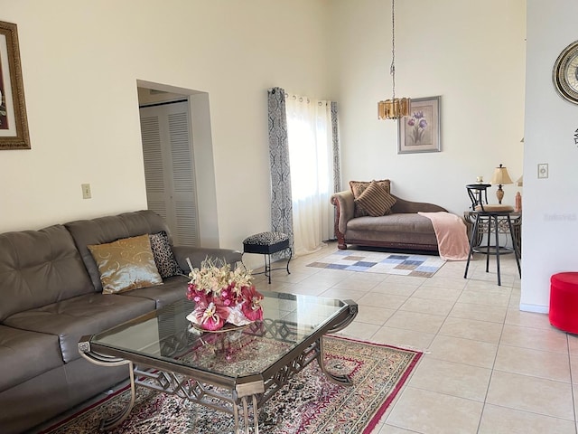 living room with light tile patterned flooring and a high ceiling