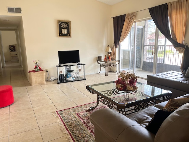 living area with light tile patterned floors