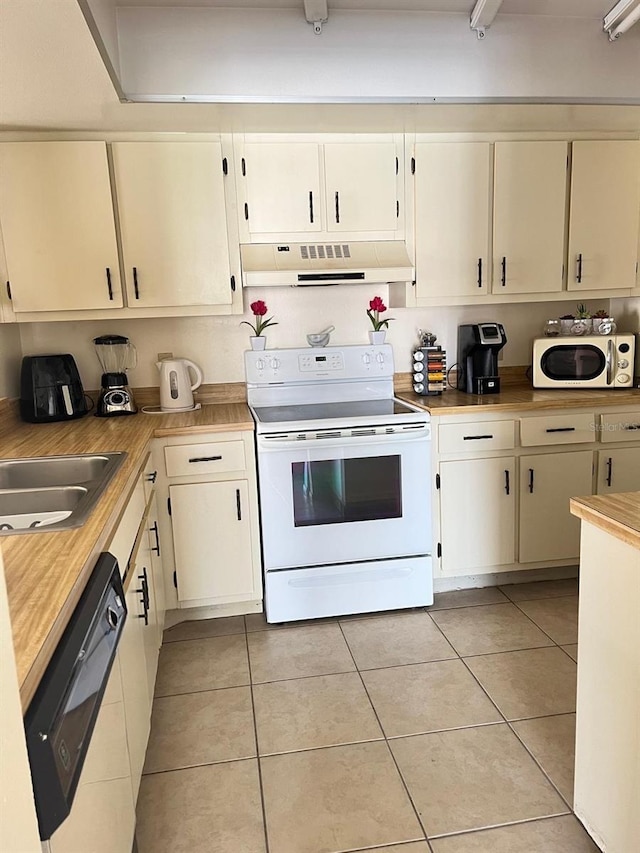 kitchen with white electric stove, under cabinet range hood, dishwashing machine, light countertops, and light tile patterned floors
