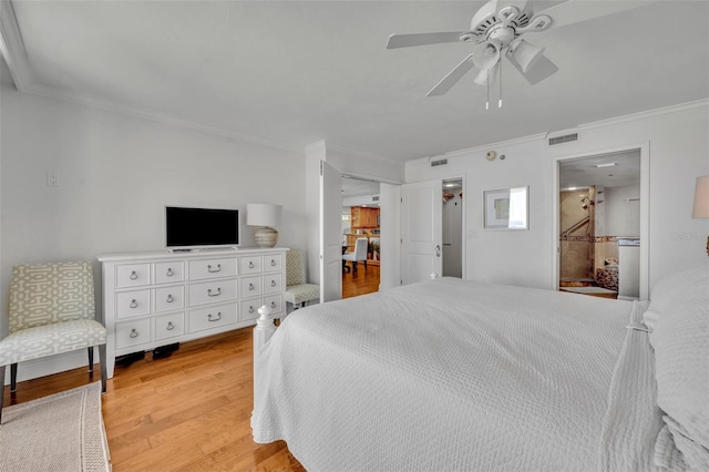 5275 S Atlantic Ave Unit 506, New Smyrna Beach, FL 32169 - bedroom featuring crown molding, light wood-type flooring, and a ceiling fan